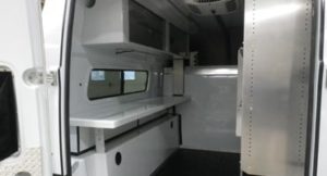 Fiber optic splicing vehicles